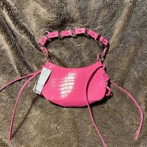 Barbie pink baguette bag.